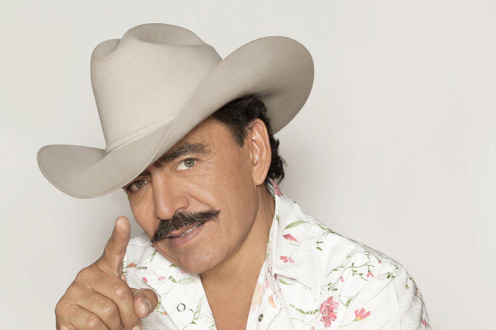 Joan Sebastian in a white cowboy hat